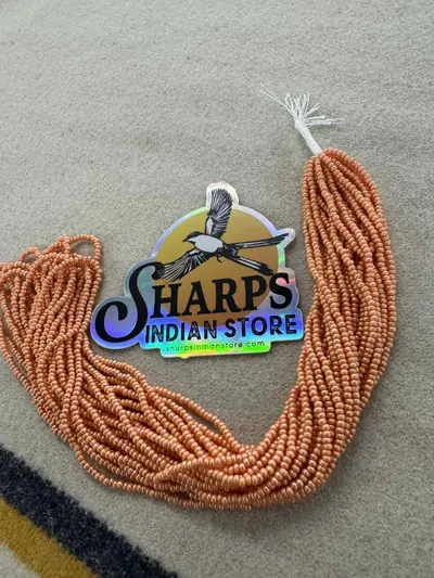 10/0 SEED BEAD #933-P PERMALUX APRICOT