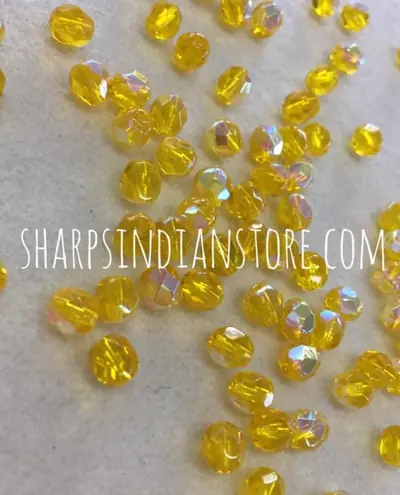 6MM GLASS FACETED CITRINE AB