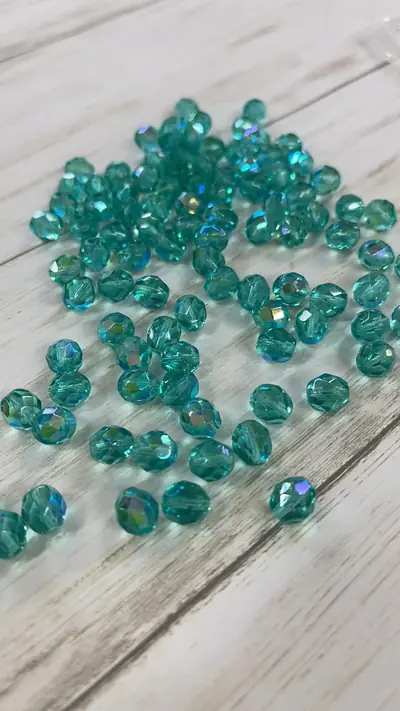 8MM GLASS FACETED 8FC565-1 MEDIUM AQUA MARINE AB
