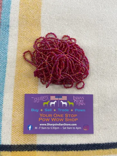 10/0 SEED BEAD 10SB544-T TRANSPARENT LIGHT RUBY AB