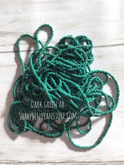 10 SEED BEAD 10SB586 DARK GREEN AB
