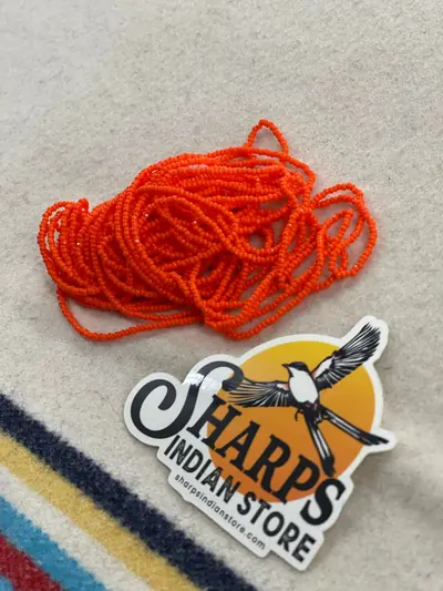 11/0 CUT BEAD 134 OPAQUE DARK ORANGE