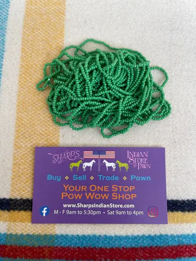11/0 CUT BEAD 184-C OPAQUE GREEN
