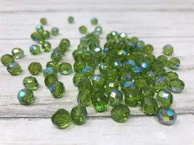 8MM GLASS FACETED 583 TRANSPARENT OLIVE AB