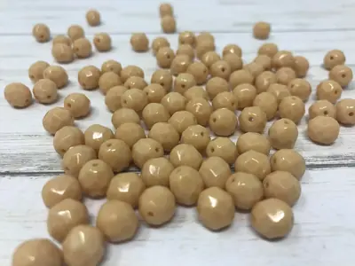8MM GLASS FACETED OPAQUE BEIGE