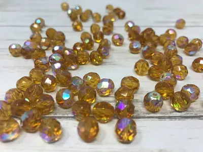 8MM GLASS FACETED TOPAZ AB