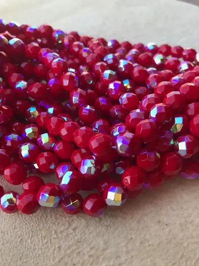 8MM GLASS FACETED OPAQUE RED AB