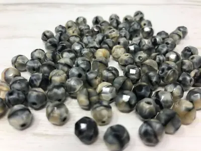 8MM GLASS FACETED GREY/TAN MARBLE