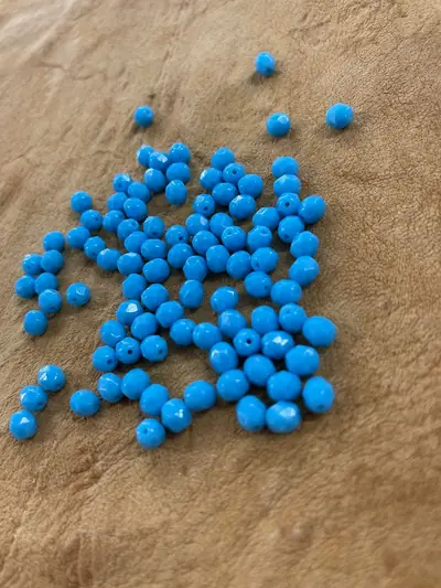 6MM GLASS FACETED 164 OPAQUE TURQUOISE