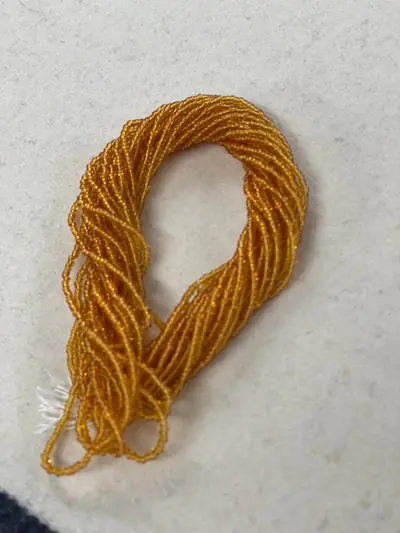 11/0 CUT BEAD #254-7C MEDIUM TOPAZ