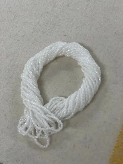 11/0 CUT BEAD #612-C PEARL WHITE