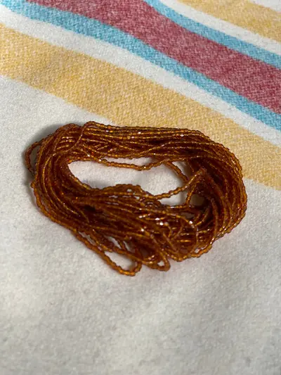 9/0 TRI CUT 258 TRANSPARENT DK TOPAZ