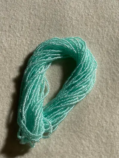 10/0 SEED BEAD #662-LP PASTEL PEARL LINED AQUA