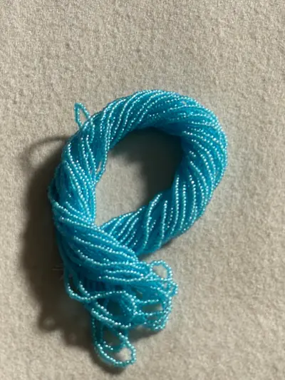 10/0 SEED BEAD #763 COLORLINED AQUA/BLUE
