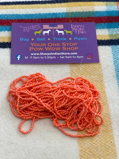 12/0 SEED BEAD #334 OPAQUE ORANGE LUSTER