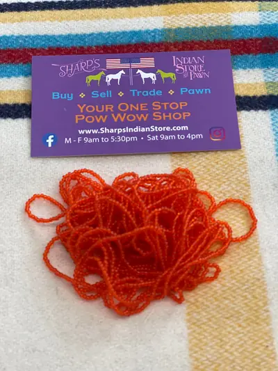 12/0 SEED BEAD #234 TRANSPARENT DARK ORANGE