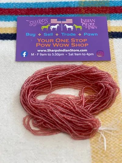 12/0 SEED BEAD #50 TRANSPARENT CHEYENNE PINK