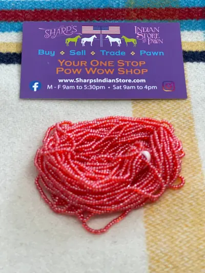 12/0 SEED BEAD #342 TRANSPARENT RED LUSTER