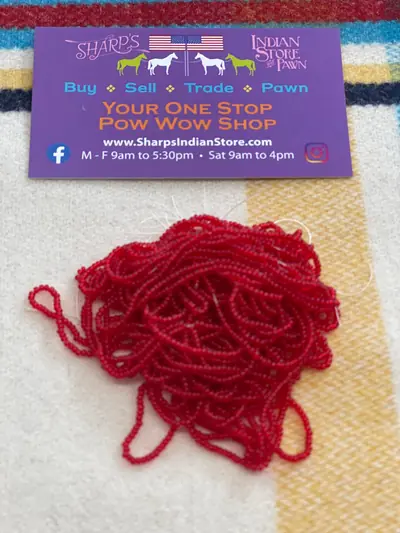 12/0 SEED BEAD #244 TRANSPARENT RED