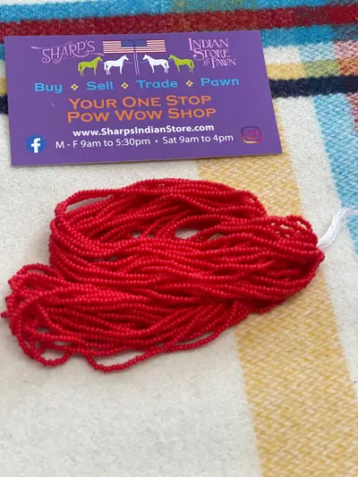 12/0 SEED BEAD #142 OPAQUE LIGHT RED