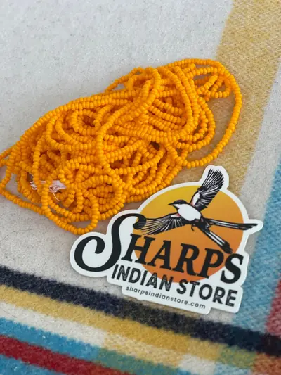 8/0 SEED BEAD #132 OPAQUE LIGHT ORANGE
