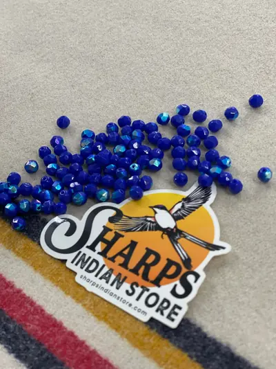 6MM GLASS FACETED OPAQUE BLUE AB