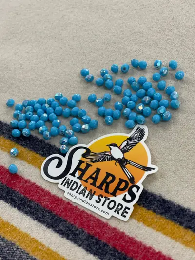 6MM GLASS FACETED OPAQUE TURQUOISE AB